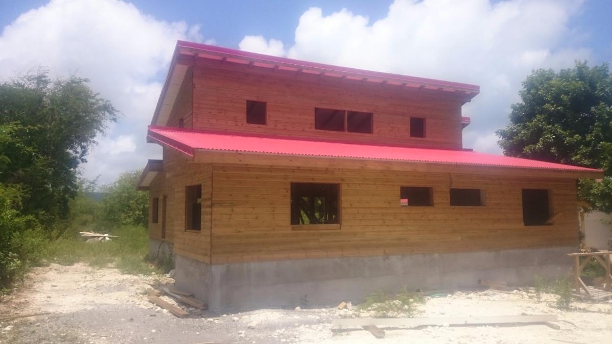 Construction maison à bardage bois horizontaux à SAINT LOUIS