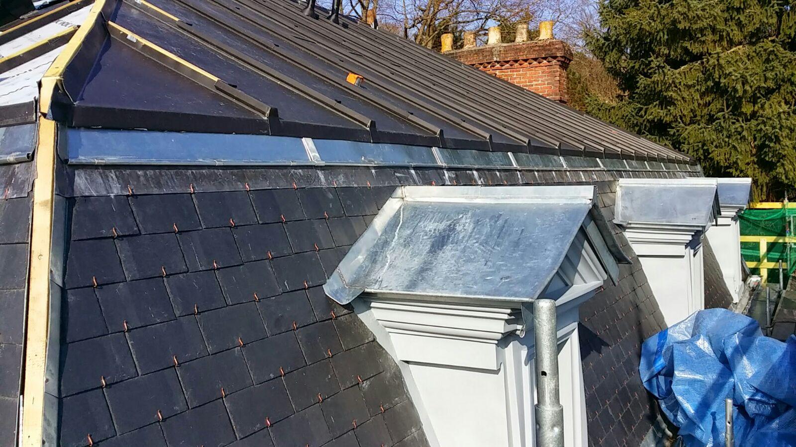 Pose de lucarnes dans le Val-d'Oise