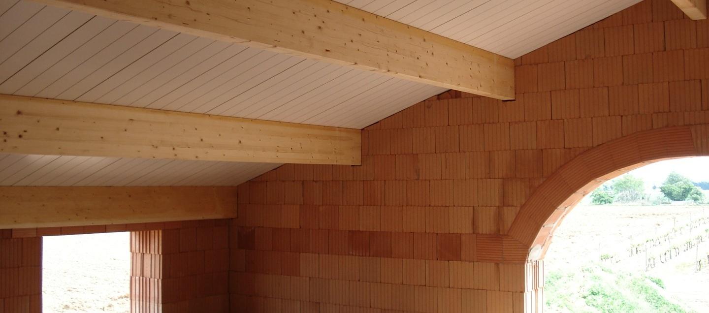 Pose de pannes lamellé collé et panneaux isolants