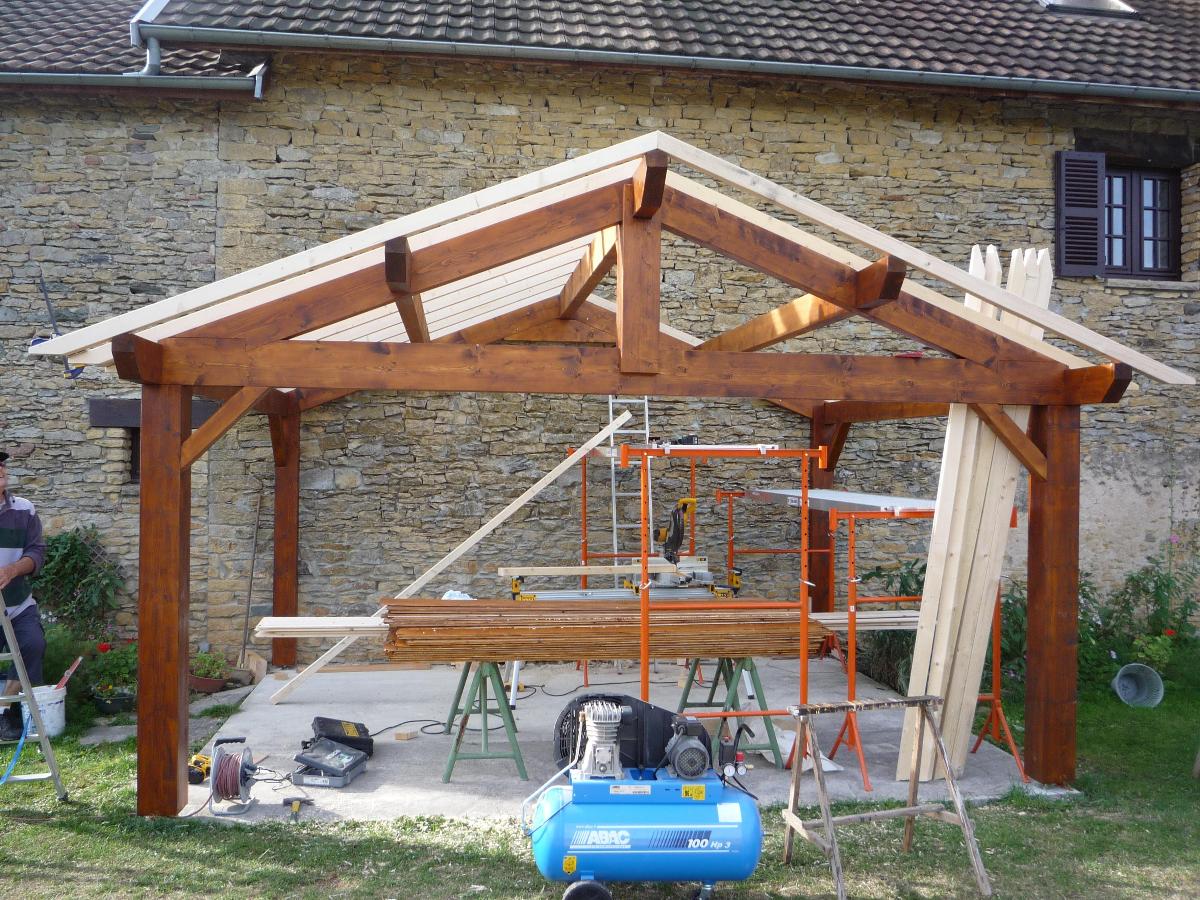 Création d'un abris fermé par baies vitrées