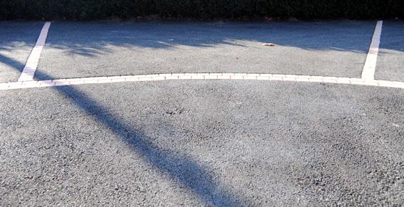 Cour en enrobé et pavés