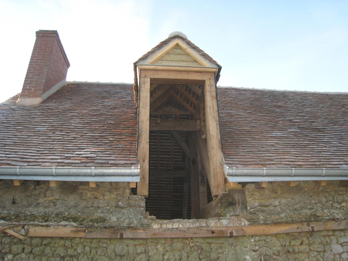 Rénovation lucarne bois