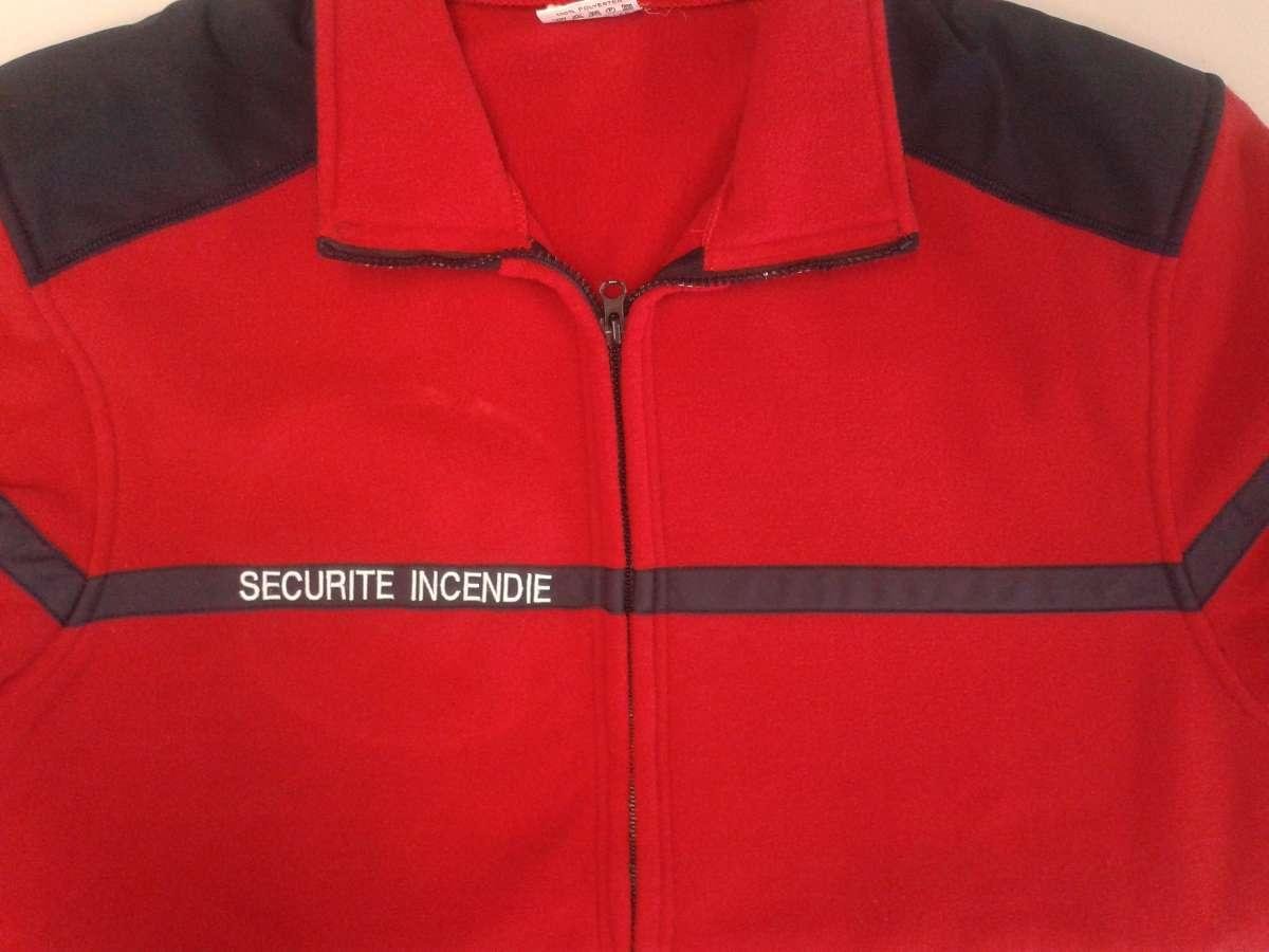 Broderie sur vêtement de travail