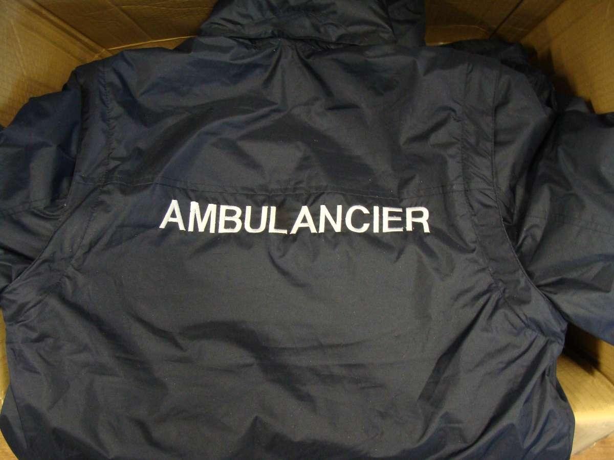 Broderie sur vêtement de travail