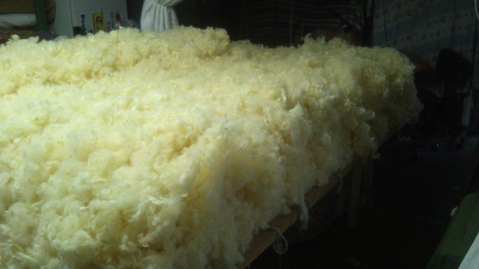 Préparation d'un matelas en laine