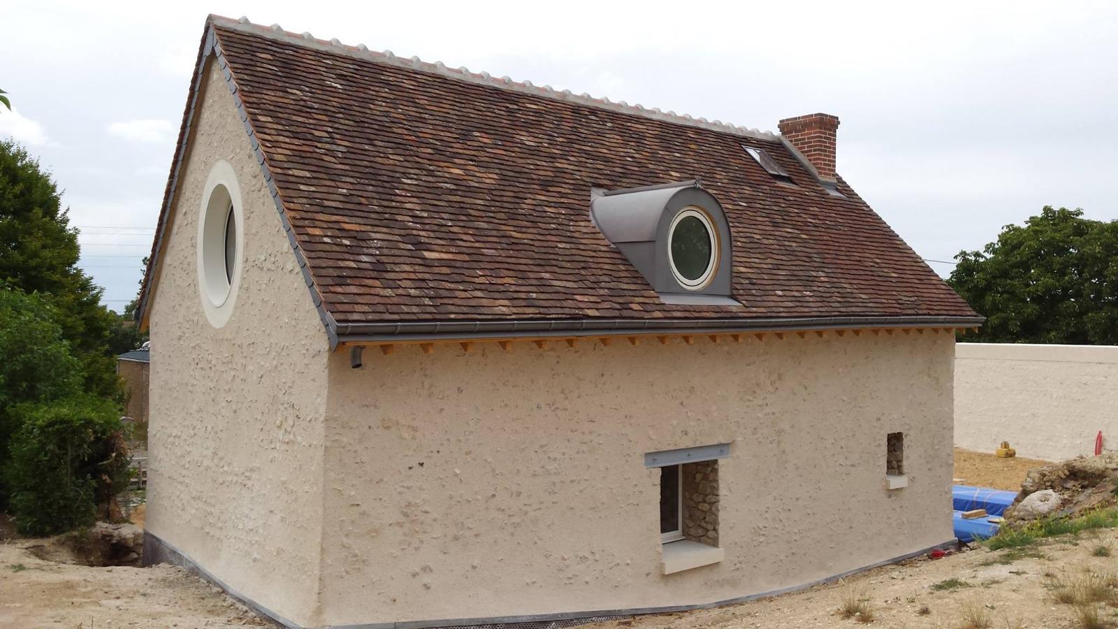 Enduit traditionnel avec têtes de moëllons