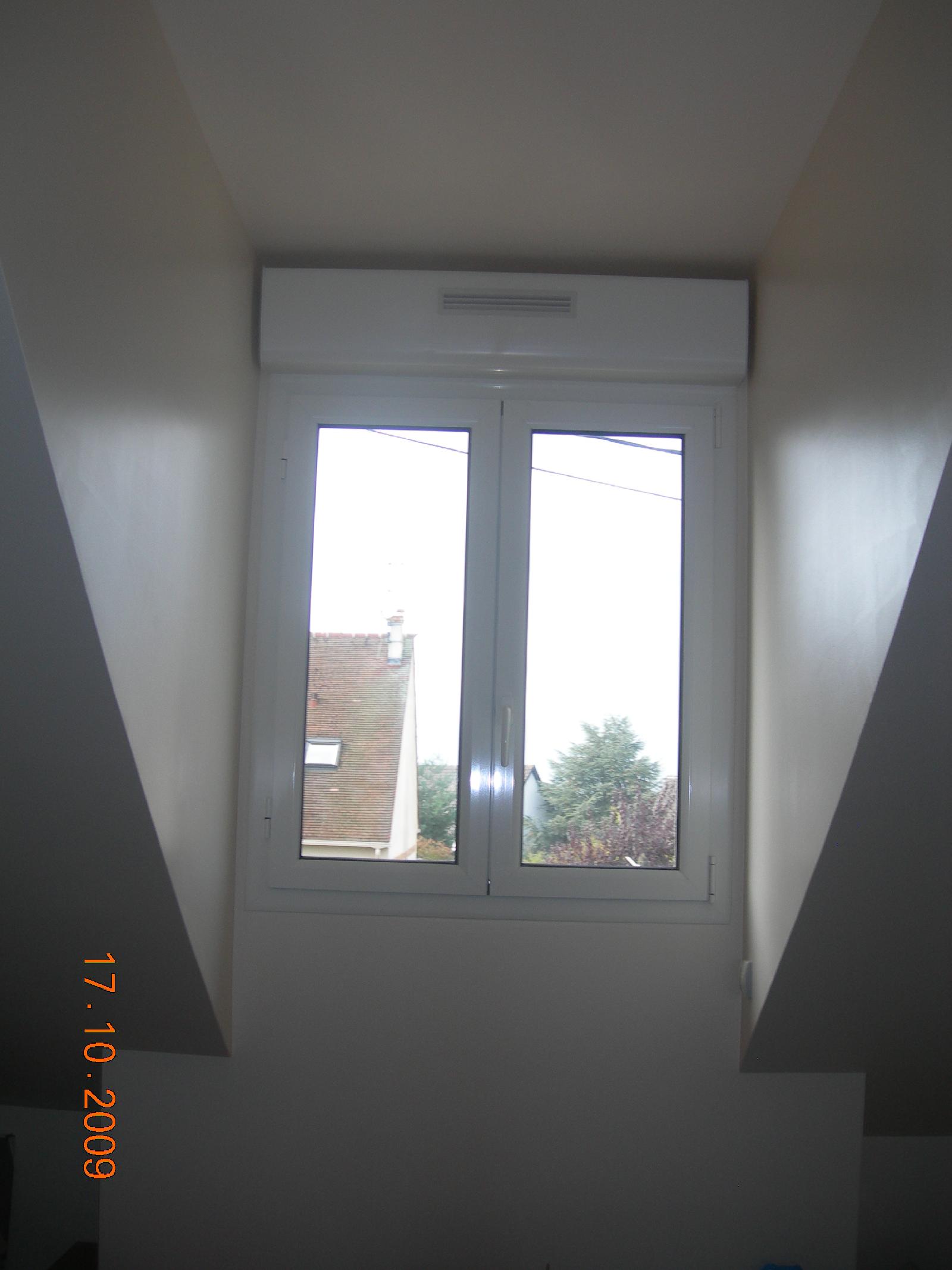 Pose de fenêtre avec volet électrique