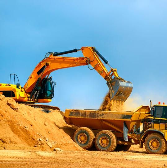 Camión cargando tierra