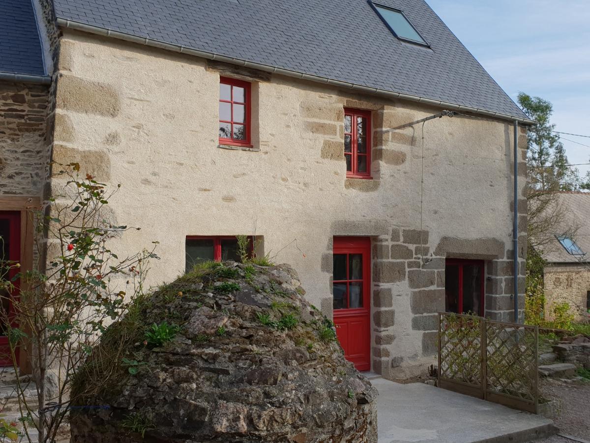 Façade enduit à pierre vue