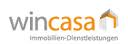 Ein Wincasa-Logo mit einem Haus darauf