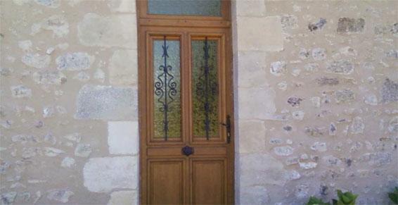 Porte d'entrée en bois - Menuiserie 03240 Tronget