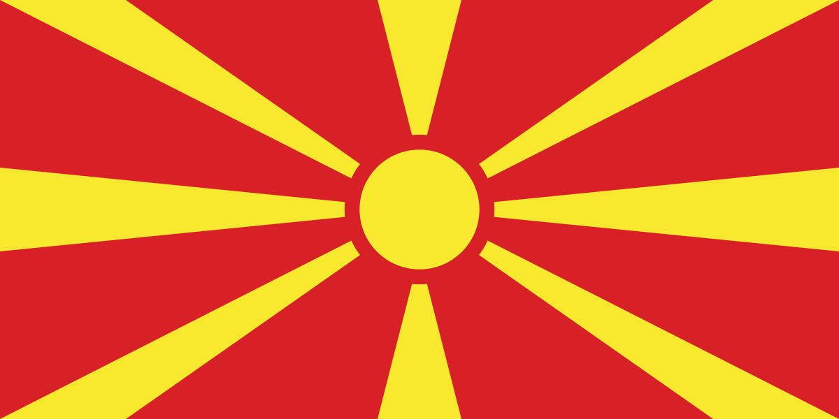 Bandera de Macedonia del Norte, que presenta un sol amarillo sobre un campo rojo.
