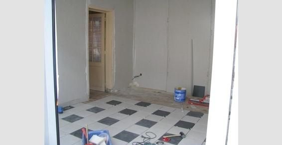 Travaux  magasin (porte automatique,carrelage,peinture,électricité)