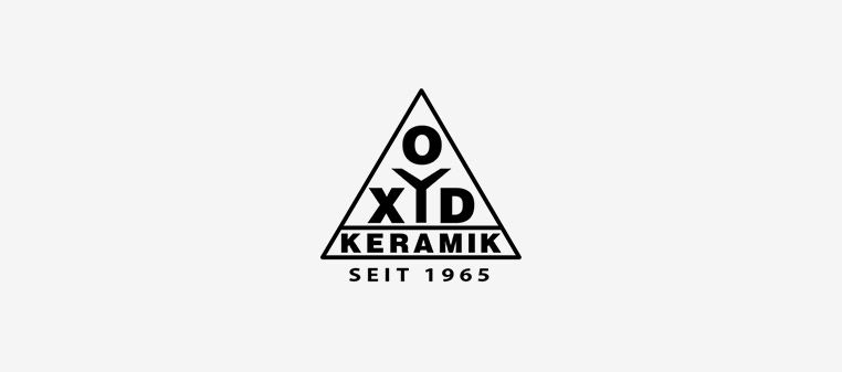 Logo für OYD Keramik, ein Keramikunternehmen. Schwarzes Dreieck mit dem Schriftzug: O, X, Y, D und Keramik, seit 1965.