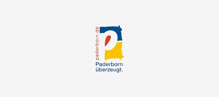Logo von Paderborn, Deutschland: ein stilisiertes „P“ in Rot, Gelb und Blau. Der Text darunter lautet: „Paderborn überzeugt“.