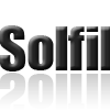 Logotipo "Solfil" com texto em gradiente preto 3D e reflexo.
