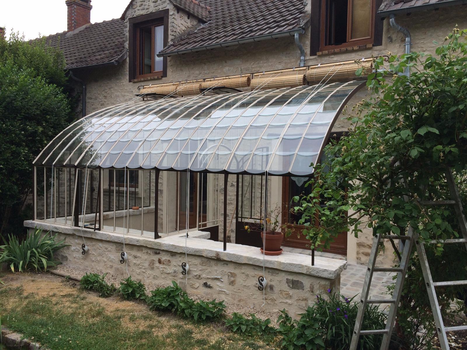 Création d'un muret en pierre pour la pose d'une veranda