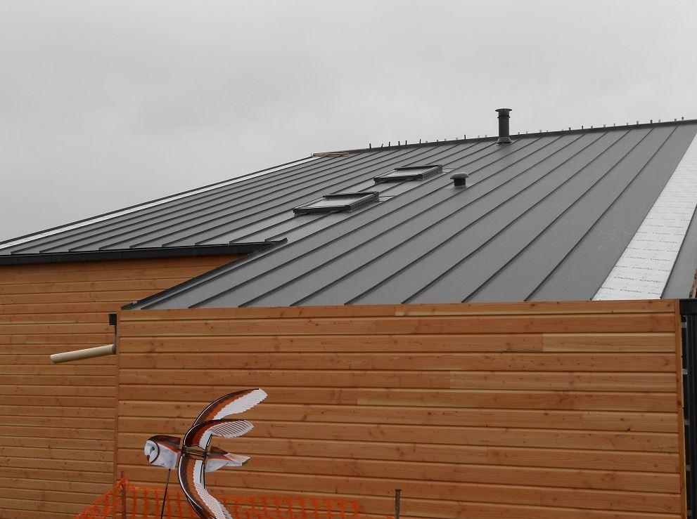 Pose d'une couverture zinc prépatiné