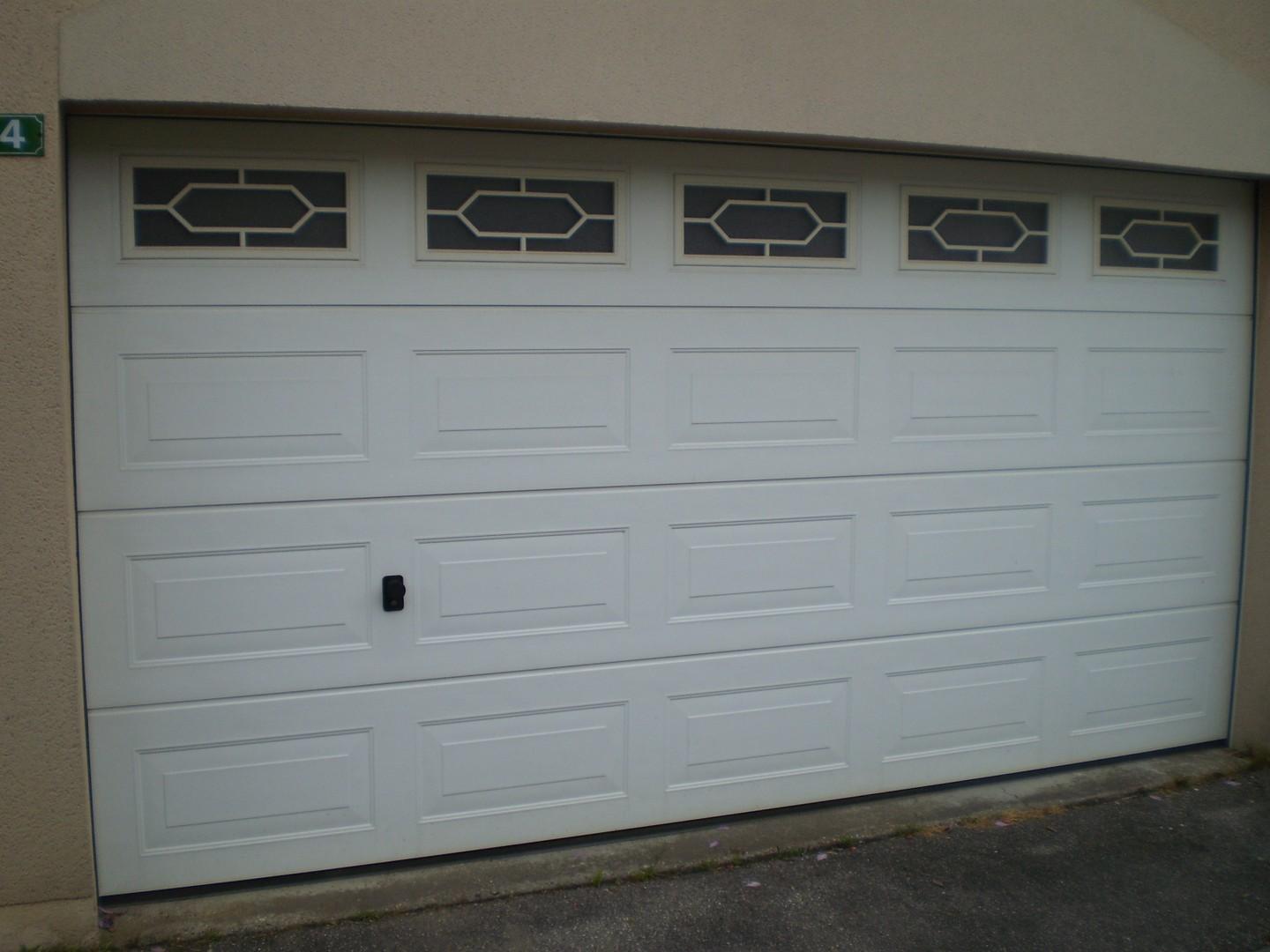 PORTE DE GARAGE SECTIONNELLE SERRURERIE LV2M