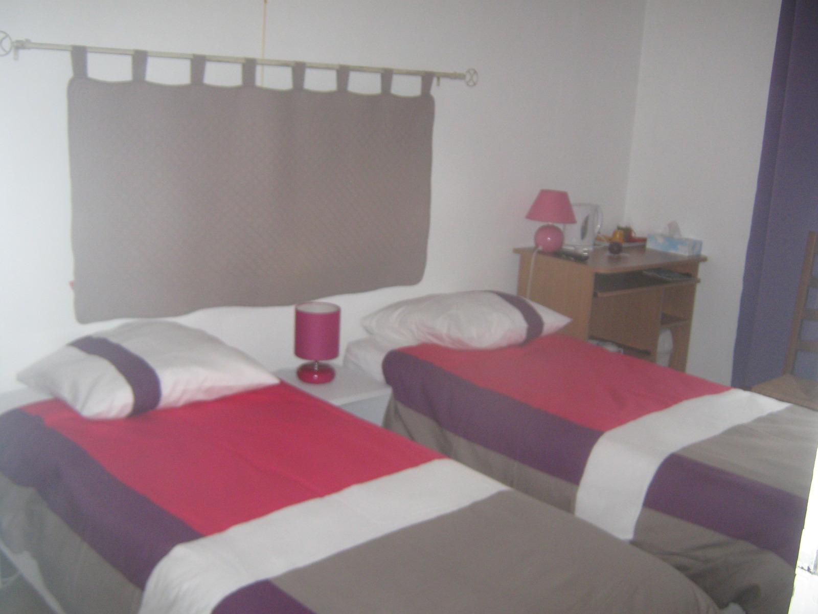 Chambre double lits simples