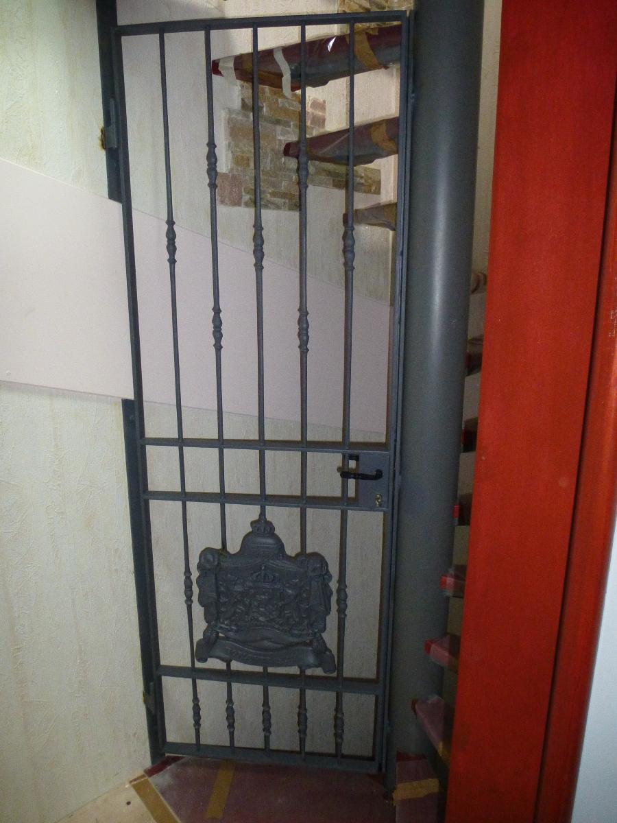 Portillon d'accès à la cave