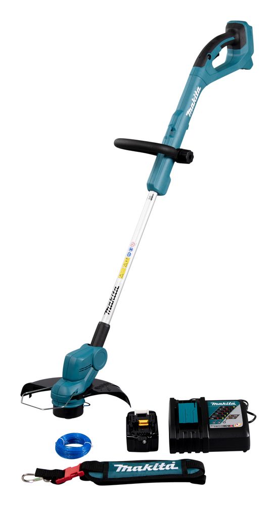 Un tagliabordi a batteria Makita con batteria e caricabatteria.