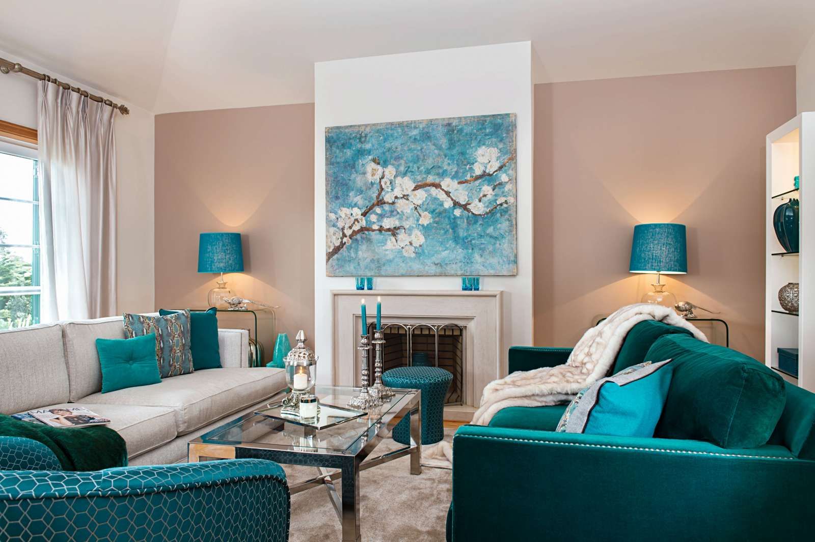 A living room filled with furniture and a fireplace.