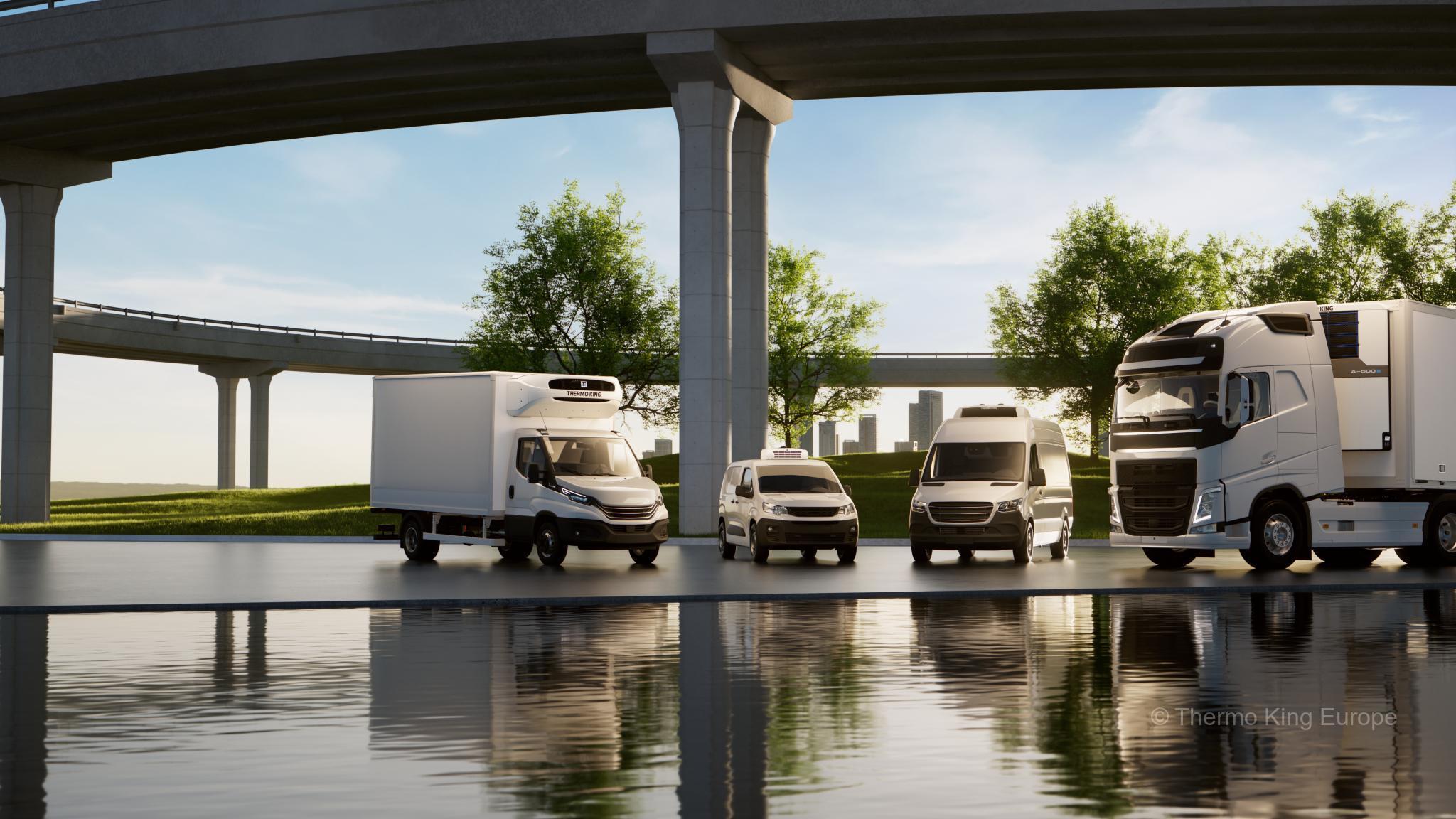 À l'intérieur d'un réfrigérateur, un composant blanc est fixé en haut, un fil métallique s'étendant vers le bas au-dessus d'étagères métalliques.