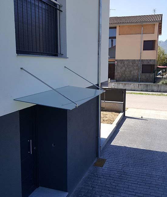 Deco-Vidre vivienda con toldo de cristal