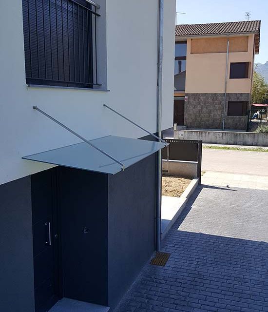 Deco-Vidre vivienda con toldo de cristal