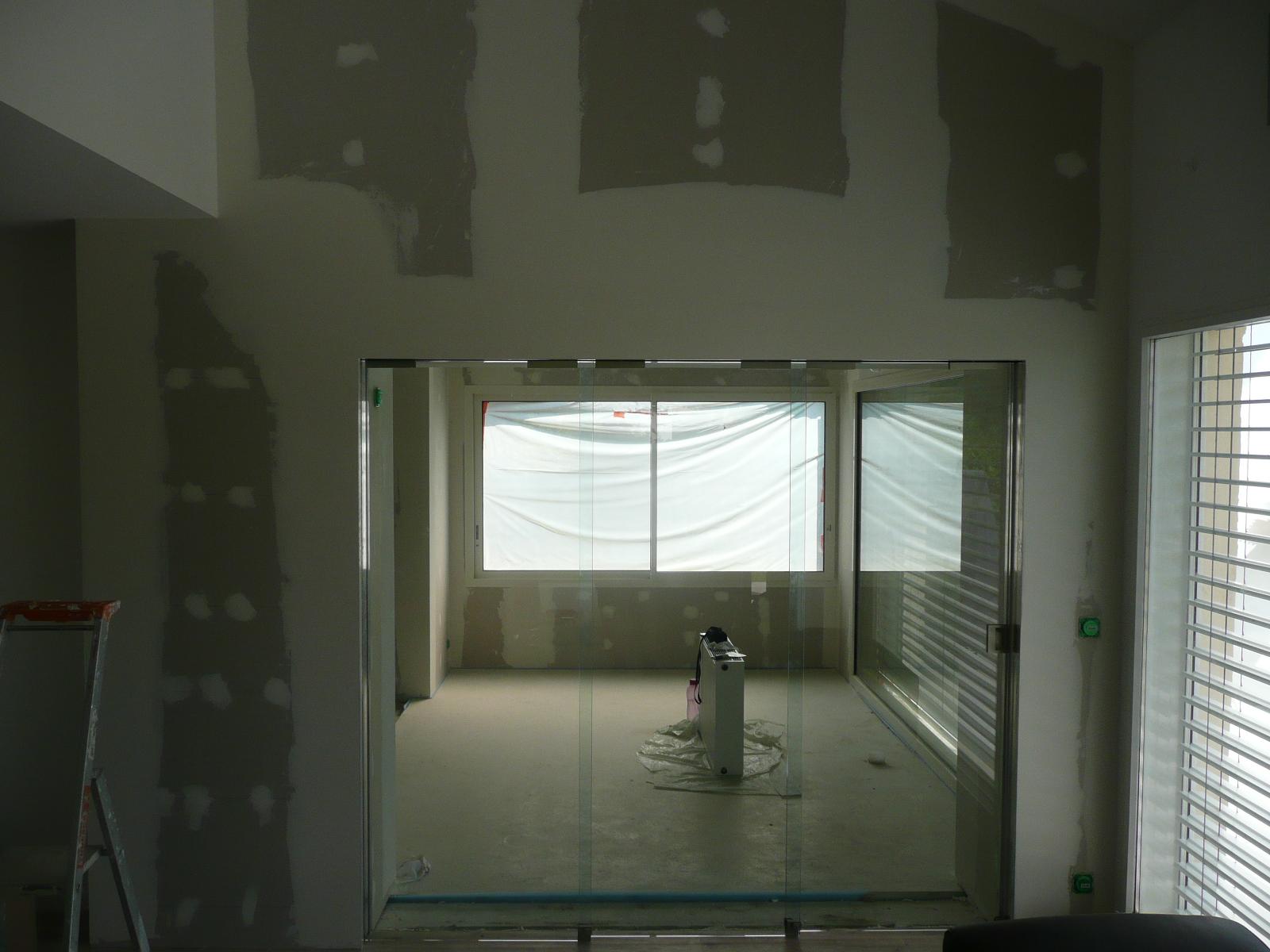 Pose d'un chassis à galandage + portes vitrées