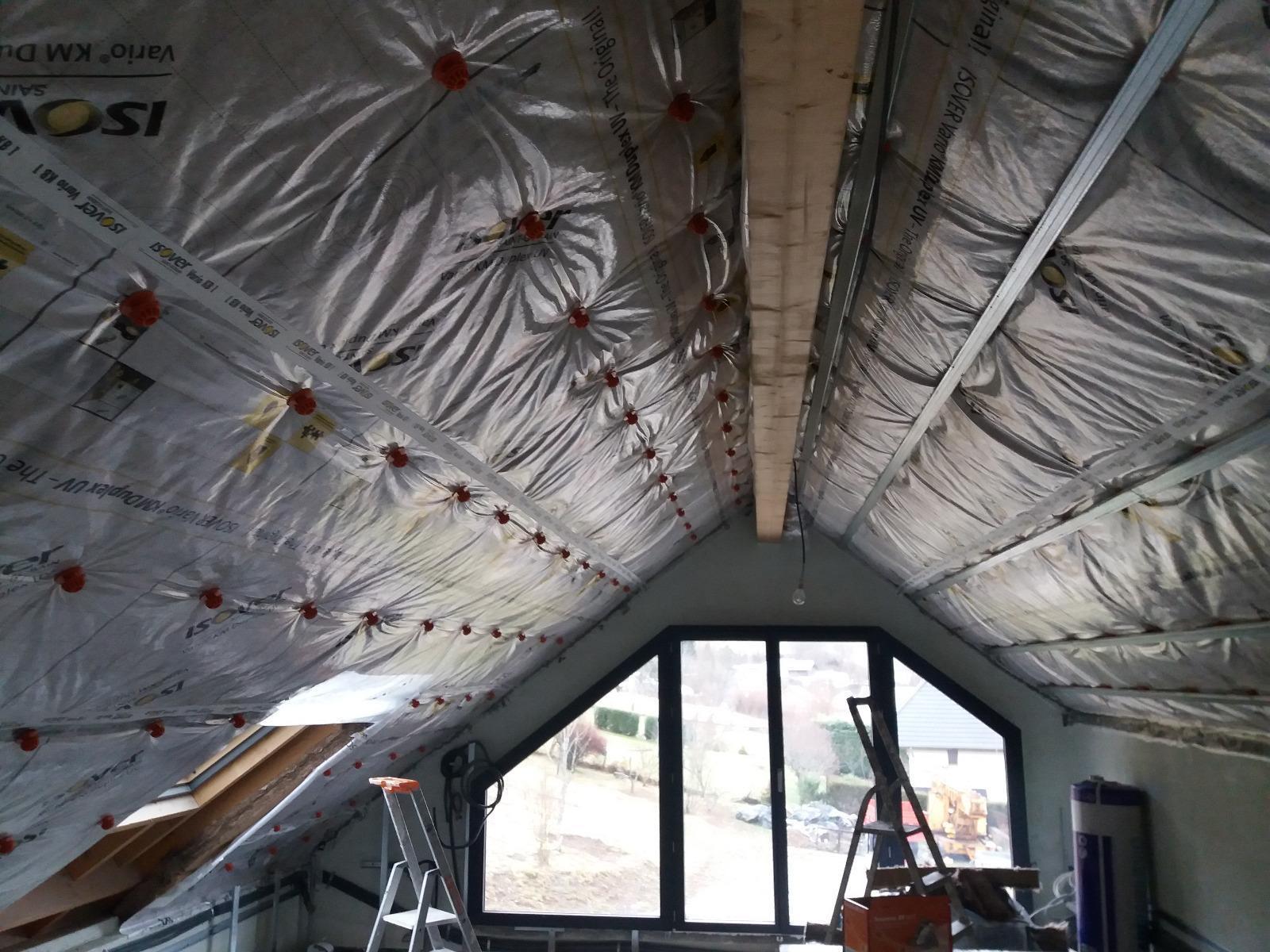 Pose d'une membrane d'étancheïté à l'air