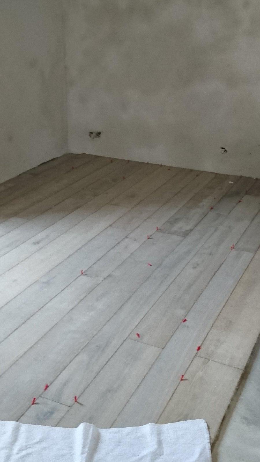 Pose collée de parquet chêne