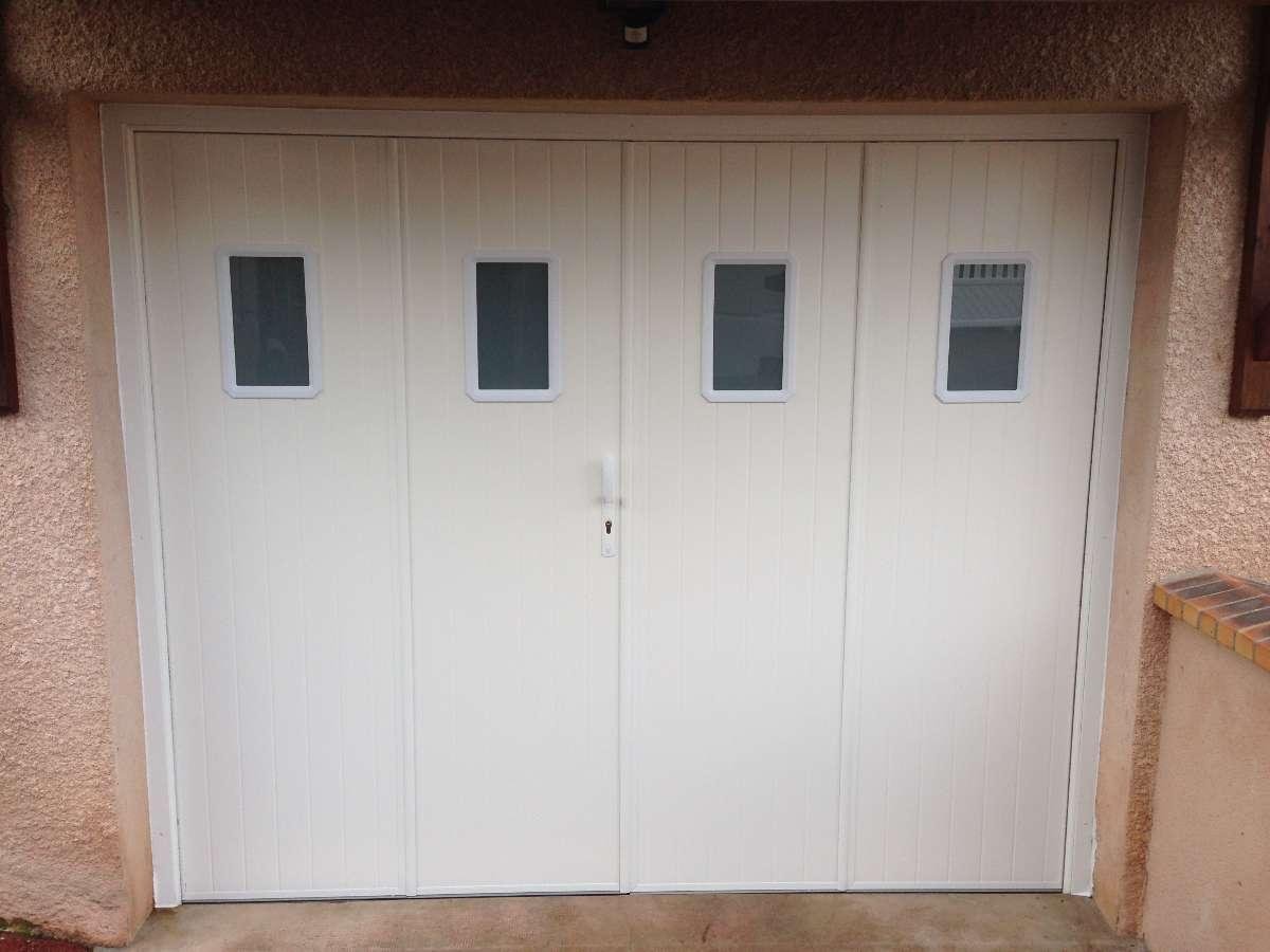 porte de garage en aluminium  4 vantaux , ste des ateliers blanzynois