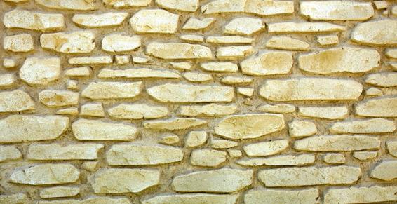 Albi Façades - Enduit projeté sur le mur puis travaillé à la main