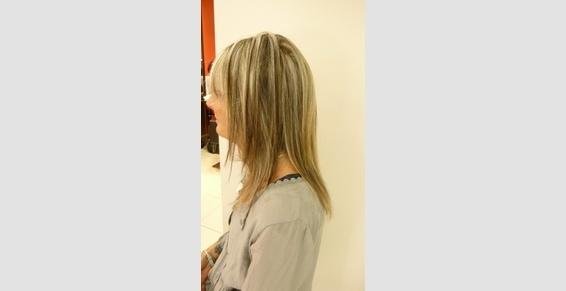 Profil d'une cliente avec des cheveux dégradés