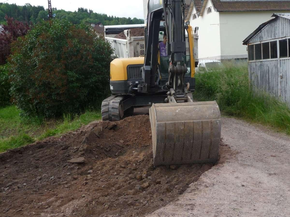 Décapage de terrain  -  Macadam Vichard à Corcieux