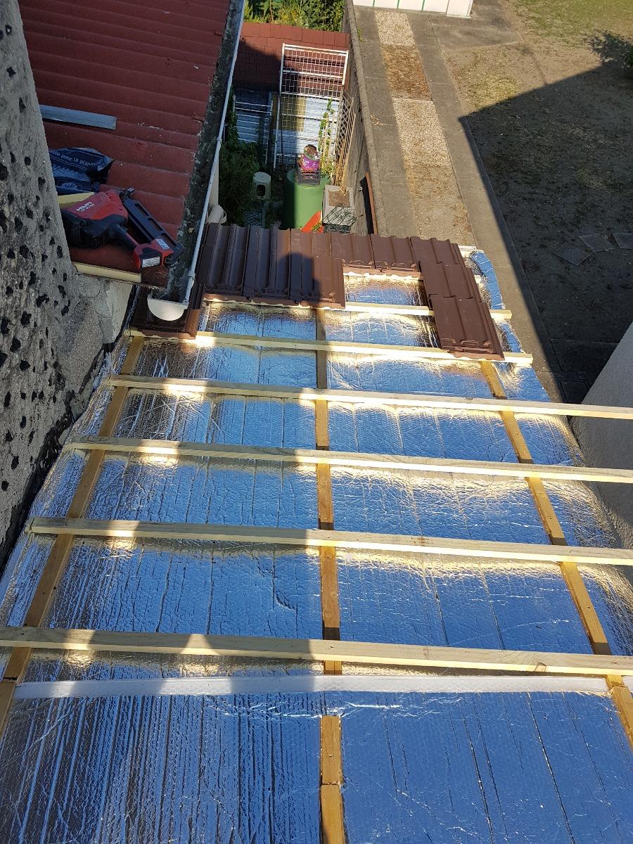 Rénovation d'une toiture - Pendant